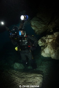 Diver/Photographer at the 'Grotto' site near Tobermory, O... by David Gilchrist 
